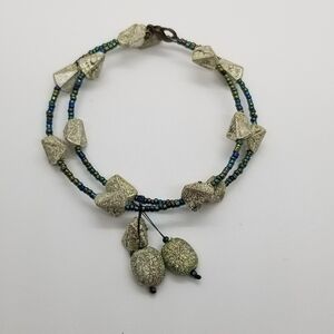 oil slick seed beed and silver wrap bracelet